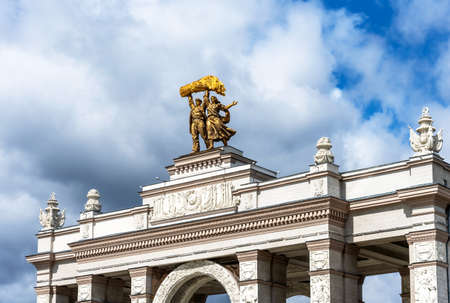 Moscow, Russia - June 30, 2021: Sculpture Worker and Kolkhoz Woman above the main entrance to the VDNKh park. The amusement park in Moscow, Russia.のeditorial素材