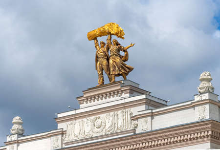 Moscow, Russia - June 30, 2021: Sculpture Worker and Kolkhoz Woman above the main entrance to the VDNKh park. The amusement park in Moscow, Russia.のeditorial素材