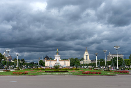 Moscow, Russia - June 30, 2021: Panoramic view Pavilion No. 58. Center Word, the Stone Flower fountain and Pavilion No. 59. Polytech. The amusement park in Moscow, Russia.のeditorial素材