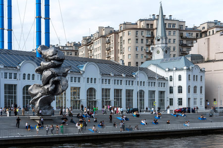 Moscow, Russia - August 29, 2021: Panoramic view of Bolotnaya embankment with GES-2 decommissioned power station, The House on the Embankment with Cinema Udarnik and Moskva river. Old decommissioned power station after renovation with Big Clay 4のeditorial素材
