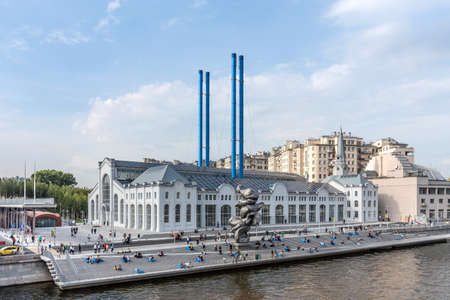 Moscow, Russia - August 29, 2021: Panoramic view of Bolotnaya embankment with GES-2 decommissioned power station, The House on the Embankment with Cinema Udarnik and Moskva river. Old decommissioned power station after renovation with Big Clay 4のeditorial素材