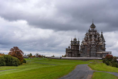 Picturesque autumn view of wooden churches on island of Kizhi, Karelia. Kizhi Pogost with The Church of the Intercession and The Church of the Transfiguration on Lake Onega in the Republic of Karelia.の写真素材