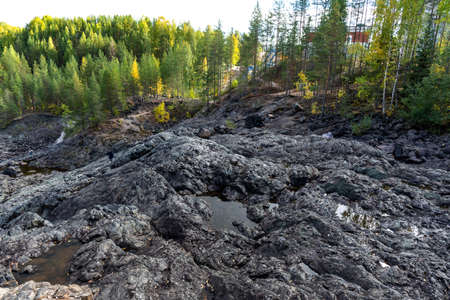 Picturesque autumn view of ancient volcano Girvas. Panoramic view of Girvas, the most ancient crater of volcano in Karelia, Russia.の写真素材