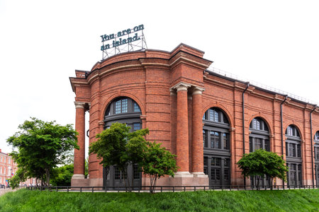 St. Petersburg, Russia - June 12, 2022: Panoramic view of the brick building of New Holland from river embankment.のeditorial素材