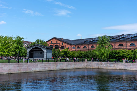 St. Petersburg, Russia - June 12, 2022: Summer view of New Holland in St. Petersburg. Petersburg. Weekend in New Holland and people resting in the park.のeditorial素材