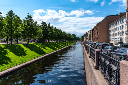 St. Petersburg, Russia - June 12, 2022: Summer view of New Holland and the Admiralty Canal in St. Petersburg. Weekend in New Holland and people resting in the park.のeditorial素材