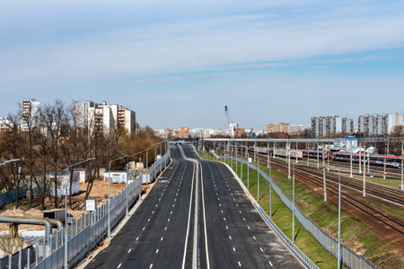 Moscow, Russia - April 16, 2023: South Eastern chord of a multi-lane express highway under construction in Moscow in the South-East. Moscow high-speed diameter, a new high-speed highway in Moscow.のeditorial素材