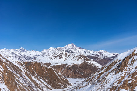 Winter view of the Caucasus Range in Gudauri, Georgia. Aerial view of snow-covered ski slopes at the Gudauri ski resort.の写真素材