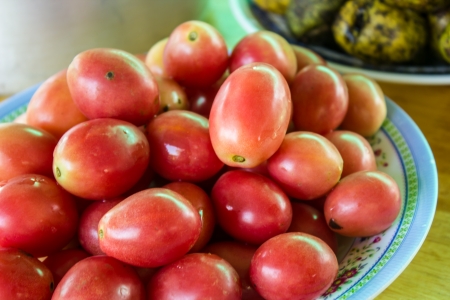 The Red tomatoes on the table.の写真素材