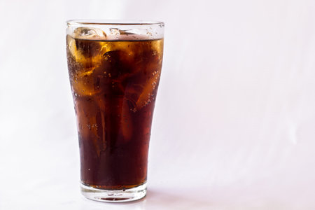 The Coke glass on a white background.