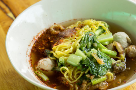 The Noodles on a wood table ready to eat