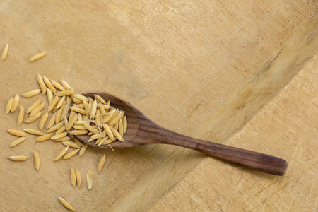 Spoon, rice, wooden spoons, wooden floors, brown, texture.の写真素材