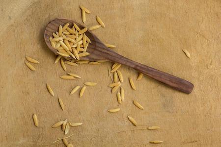 Spoon, rice, wooden spoons, wooden floors, brown, texture.の写真素材