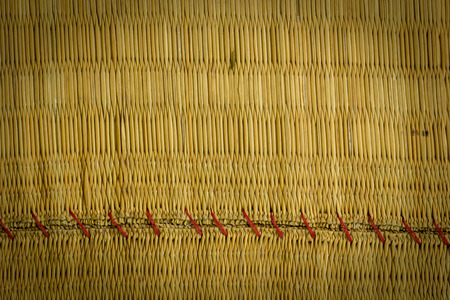 Wicker textured background red paint.の写真素材