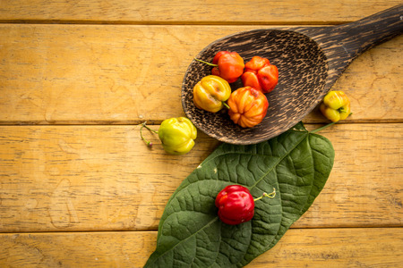 Cherry wood table spoon of fresh fruit, organic fruit.の写真素材