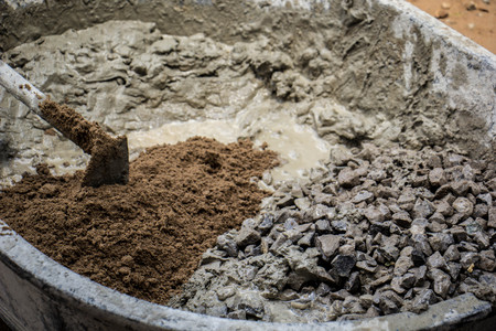 Cement or mortar is inside cement mixer. Cement or mortar is mixの写真素材