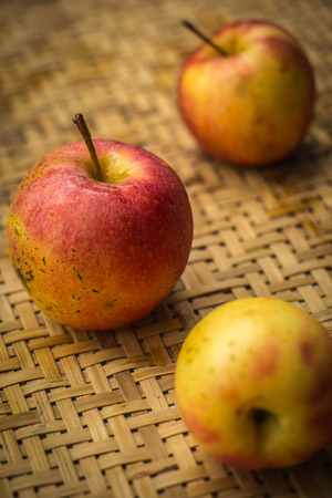 Ripe red apples on table close upの写真素材