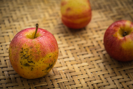 Ripe red apples on table close upの写真素材