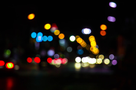 Artistic style - Defocused urban abstract texture bokeh city lights in the background with blurring lights for your designの写真素材
