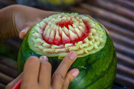 Watermelon Carving with hand thailandの写真素材