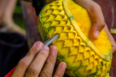 Thailand carved pumpkin with handの写真素材