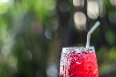 Roselle juice on ice. Organic on brown wood floor for healthyの写真素材