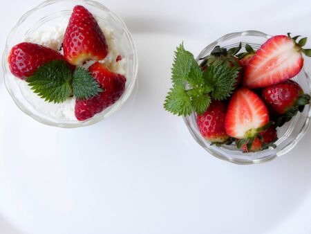 strawberries in bowl on white backgroundの写真素材