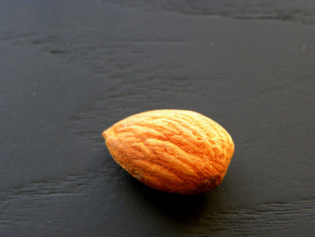 almonds close-up on a black background