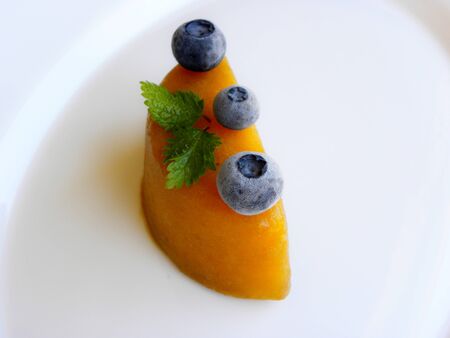 yellow ice cream, popsicles, blueberriesの写真素材