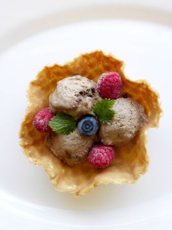 chocolate ice cream in a waffle basketの写真素材