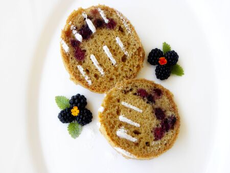 blackberry cupcake on a white backgroundの写真素材