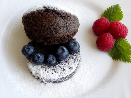 chocolate cake with blueberries and raspberries