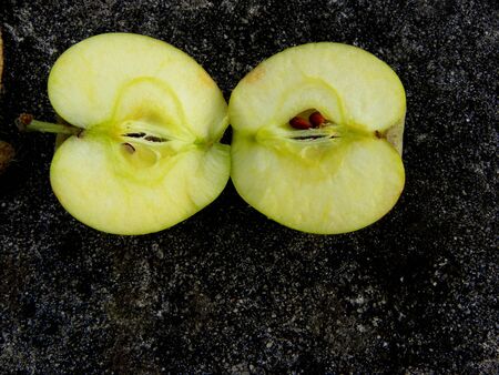 cutaway apple on a gray backgroundの写真素材
