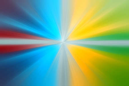 Abstract radial zoom blur surface in yellow, green, blue and red tones. Abstract background with radial, radiating, converging lines.の写真素材