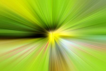 Abstract green and yellow background zoom effect. Digital image. Rays of green, yellow, black light. Colored radial blur, fast zoom, solar or star flares. Use for banner backgroundの写真素材