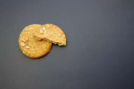 Round oatmeal cookies on a gray background.の写真素材