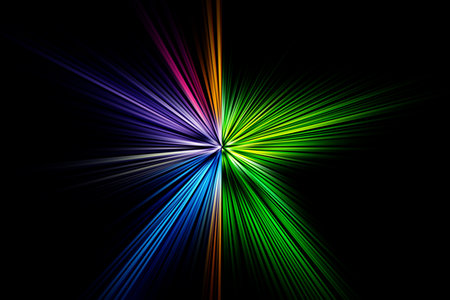 Abstract surface of blur radial zoom in blue, yellow and green tones on a black background. Abstract multicolored background with radial, diverging, converging lines in the shape of a star.の写真素材