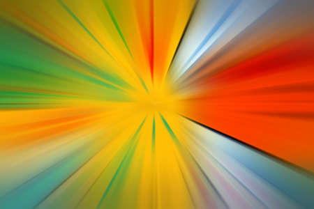 Abstract radial zoom blur surface of yellow, orange and green tones. Blurred colorful background with radial, radiating, converging lines.の写真素材
