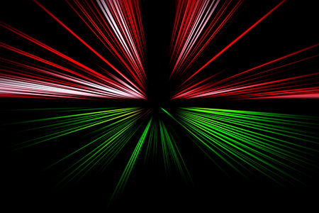 Abstract surface of radial zoom blur in green and red tones on a black background. Spectacular colorful background with radial, diverging, converging lines. Bicolor backgroundの写真素材