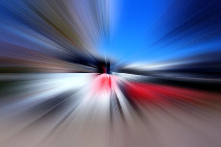 Abstract radial zoom blur surface in blue, gray and red tones. Bright background with radial, radiating, converging lines.の写真素材