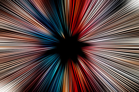 Abstract radial zoom blur surface of in blue, orange and red tones on a black background. Spectacular background with radial, radiating, converging lines.の写真素材