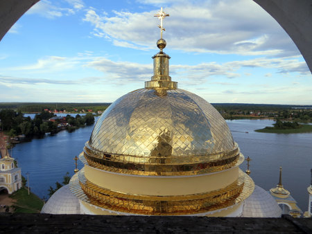 View of the Orthodox church cupola with the blue Seliger lake in the background, Russiaの写真素材