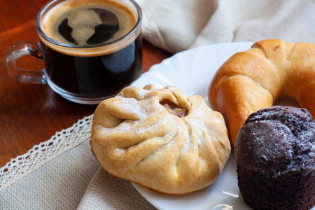 Sweet breakfast coffee bagel bun and muffin