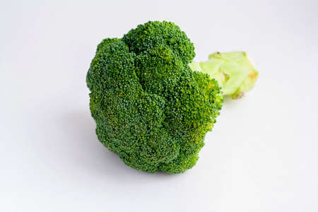 Ripe raw broccoli isolated on a white backgroundの写真素材