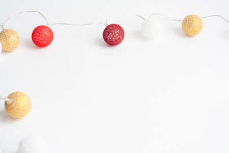 Christmas garland of balloons on a white background, copy spaceの写真素材
