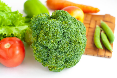Broccoli and other healthy vegetables and fruits on the table