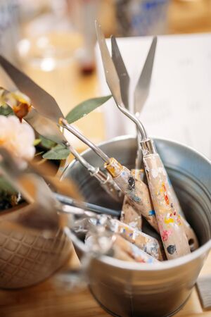 working tools of the artist. palette knife stand in a glassの写真素材