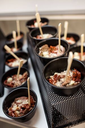 Catering. Small plates with dessert. Different focusの写真素材