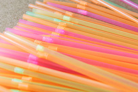 Colorful drinking straws for the color background. The problem of environmental pollution.の写真素材
