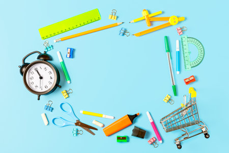 Frame from school stationery on a blue background. Concept back to school. Study concept. Stationery...